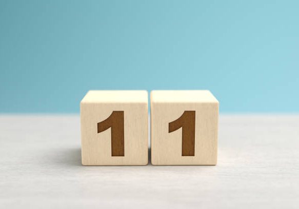 Wooden toy blocks forming the number 11. Wooden toy blocks forming the number 11.