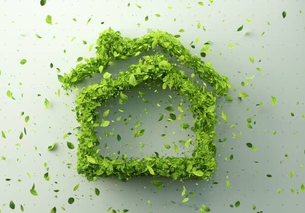 Green Building Digital generated image of house icon made out of leaves on white green background.