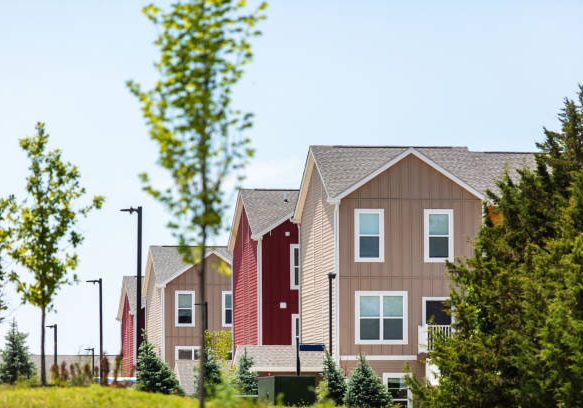 Multi Unit In Northwestern Kansas Row of Bright Multi-Colored Homes on a Sunny Summer Day (Shot with Canon 5DS 50.6mp photos professionally retouched - Lightroom / Photoshop - original size 5792 x 8688 downsampled as needed for clarity and select focus used for dramatic effect)